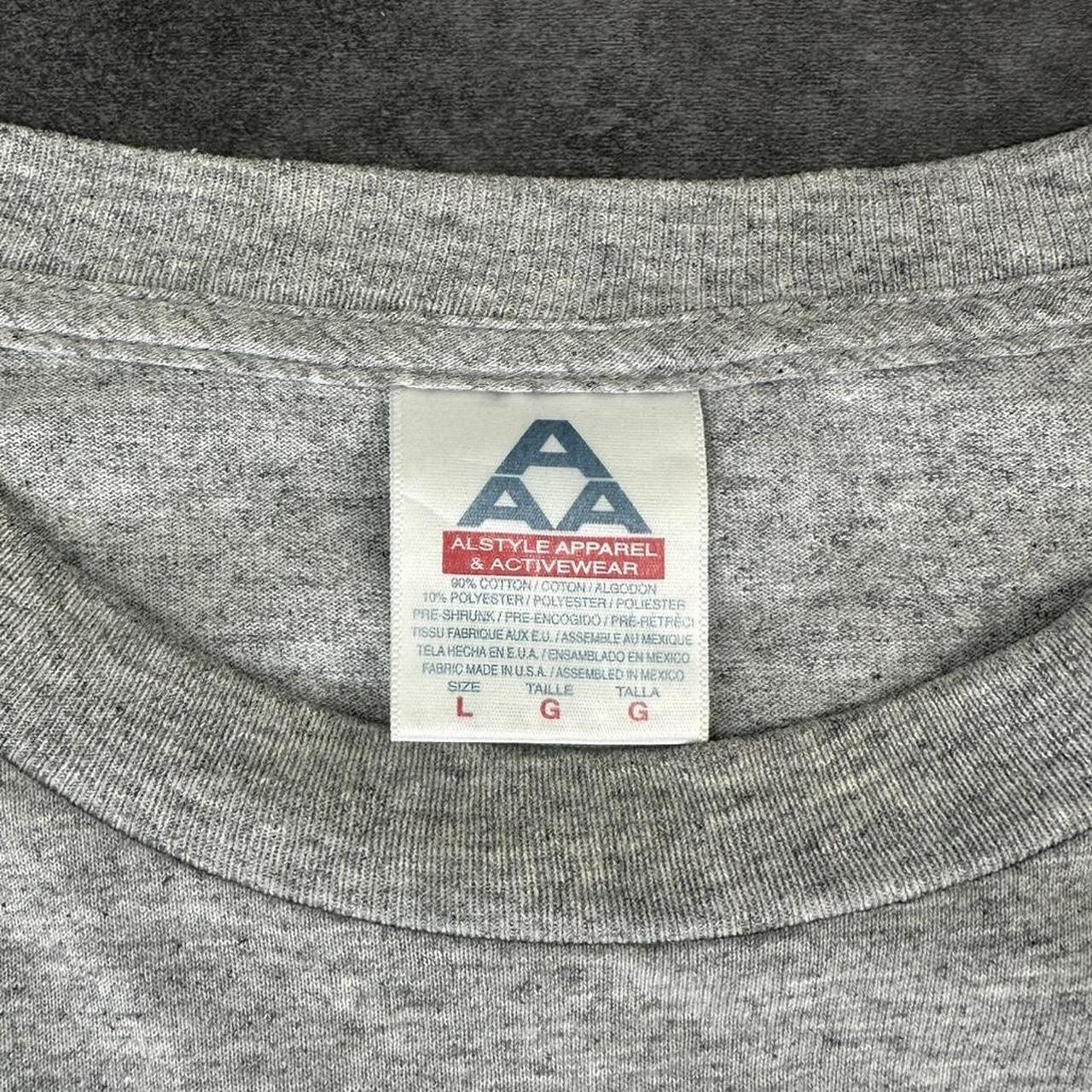 Alstyle Apparel 2000s Logo Waikiki Hawaii Tribal Pattern waves Print graphic logo T shirt