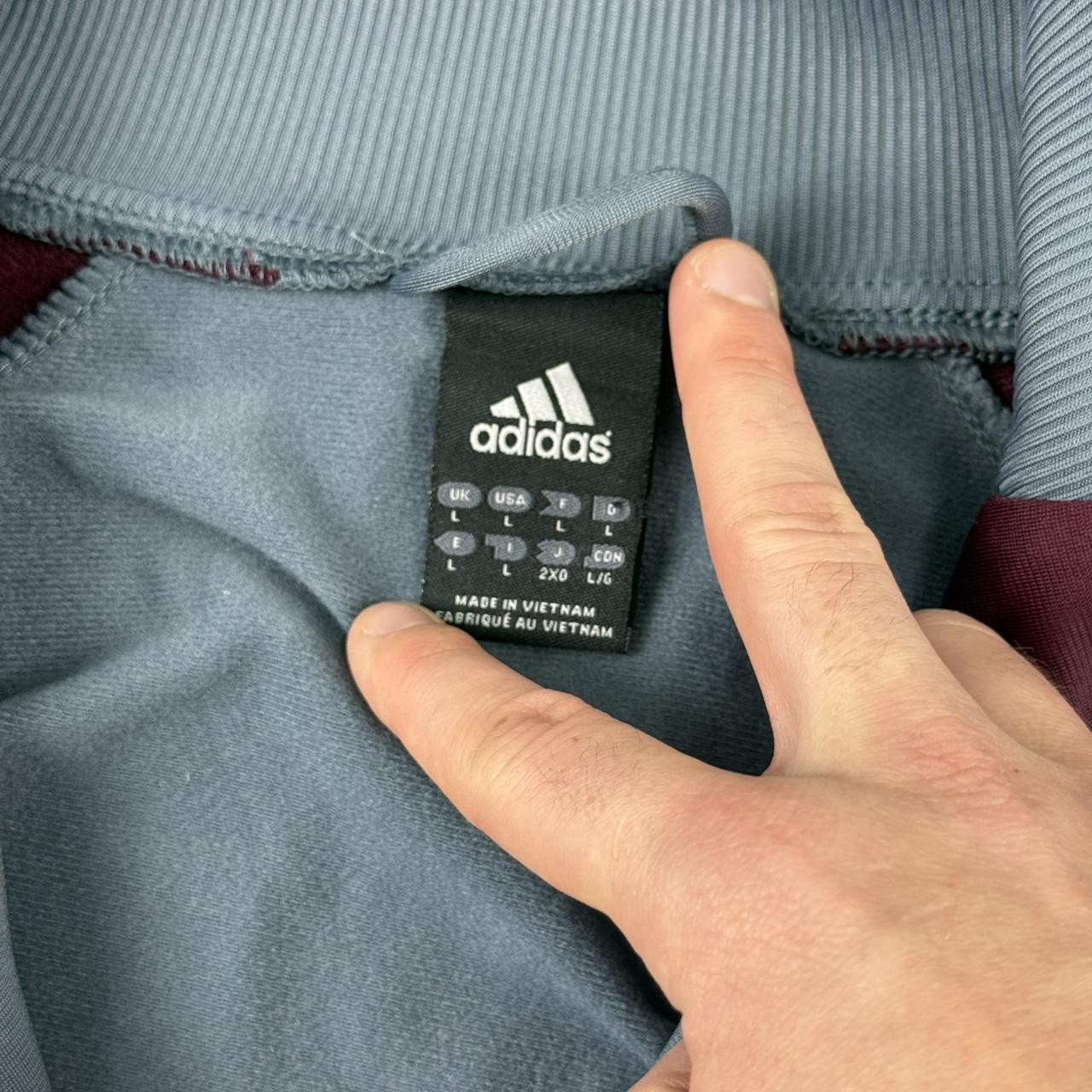 Vintage Adidas 2008 spellout embroidered logo sportswear three stripe track jacket