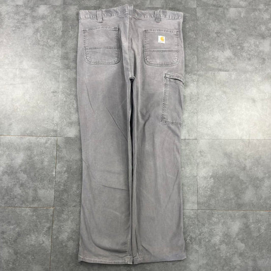Carhartt 2000s dungaree workwear comfort fit denim cargo trousers