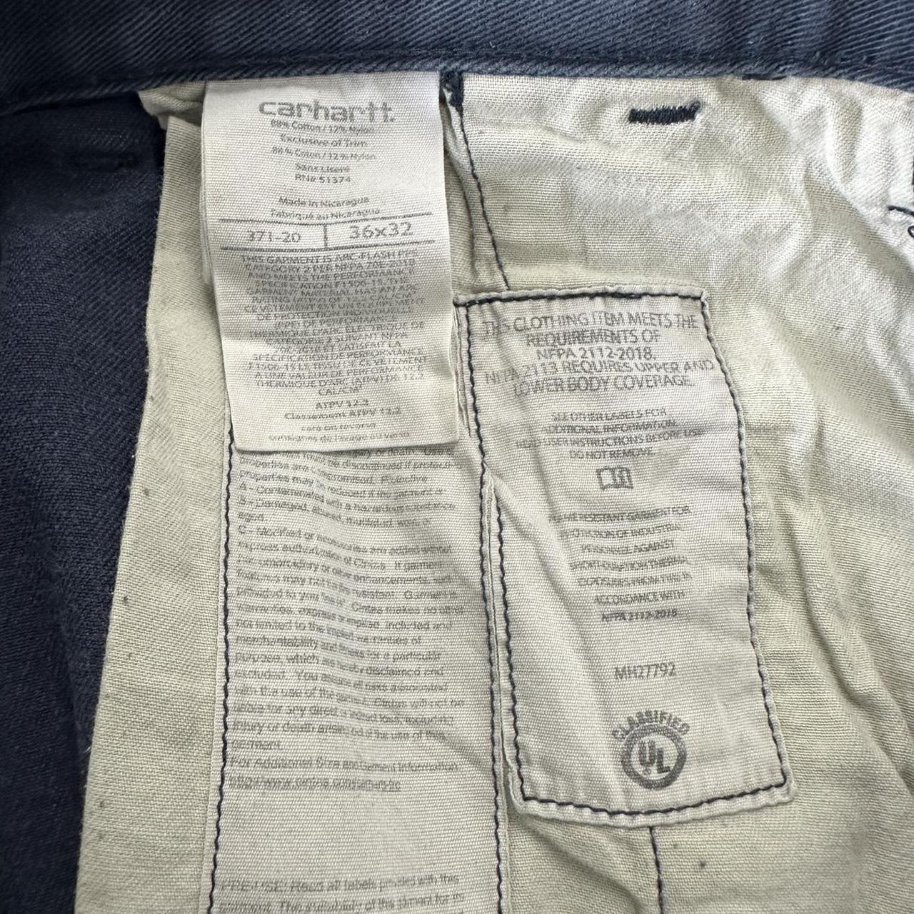 Carhartt 2000s dungaree workwear comfort fit denim cargo trousers