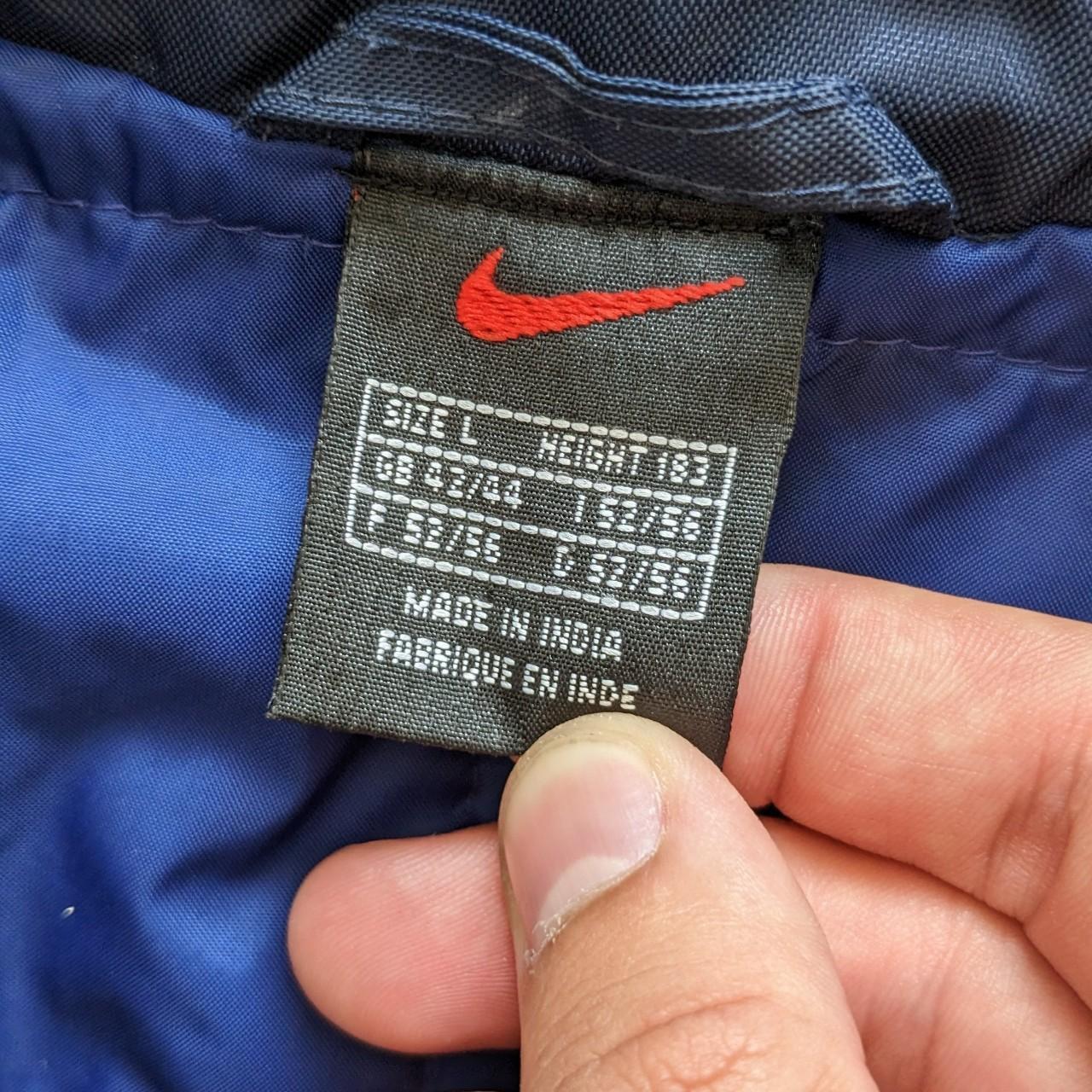 Mad Nike 00s vintage padded jacket in navy