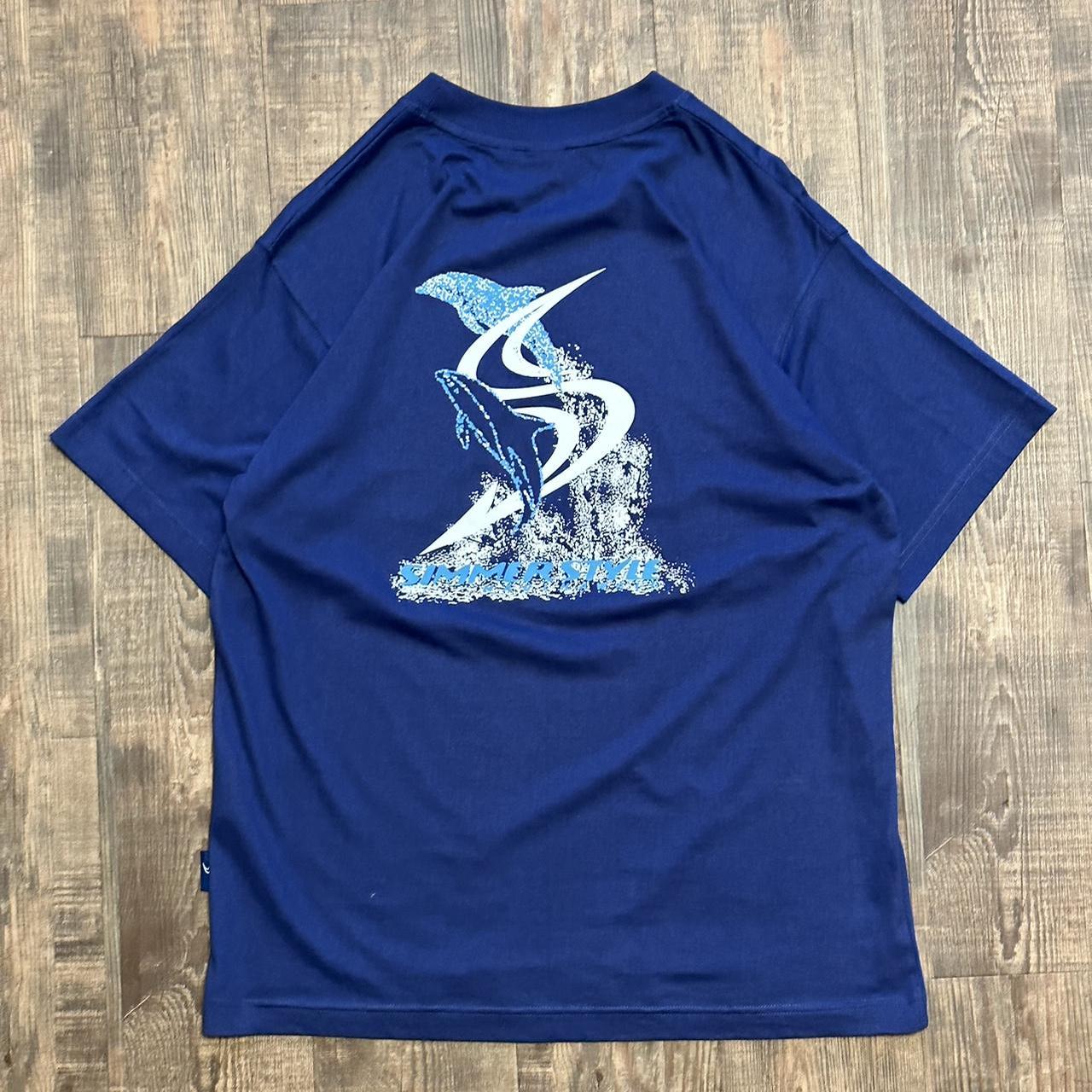 Simmerstyle 00s surf style boardcore T shirt in dark blue with big dolphin logo on back and mini bre