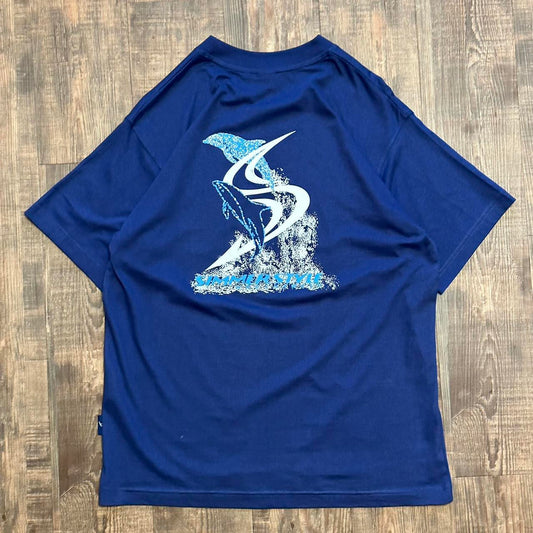 Simmerstyle 00s surf style boardcore T shirt in dark blue with big dolphin logo on back and mini bre