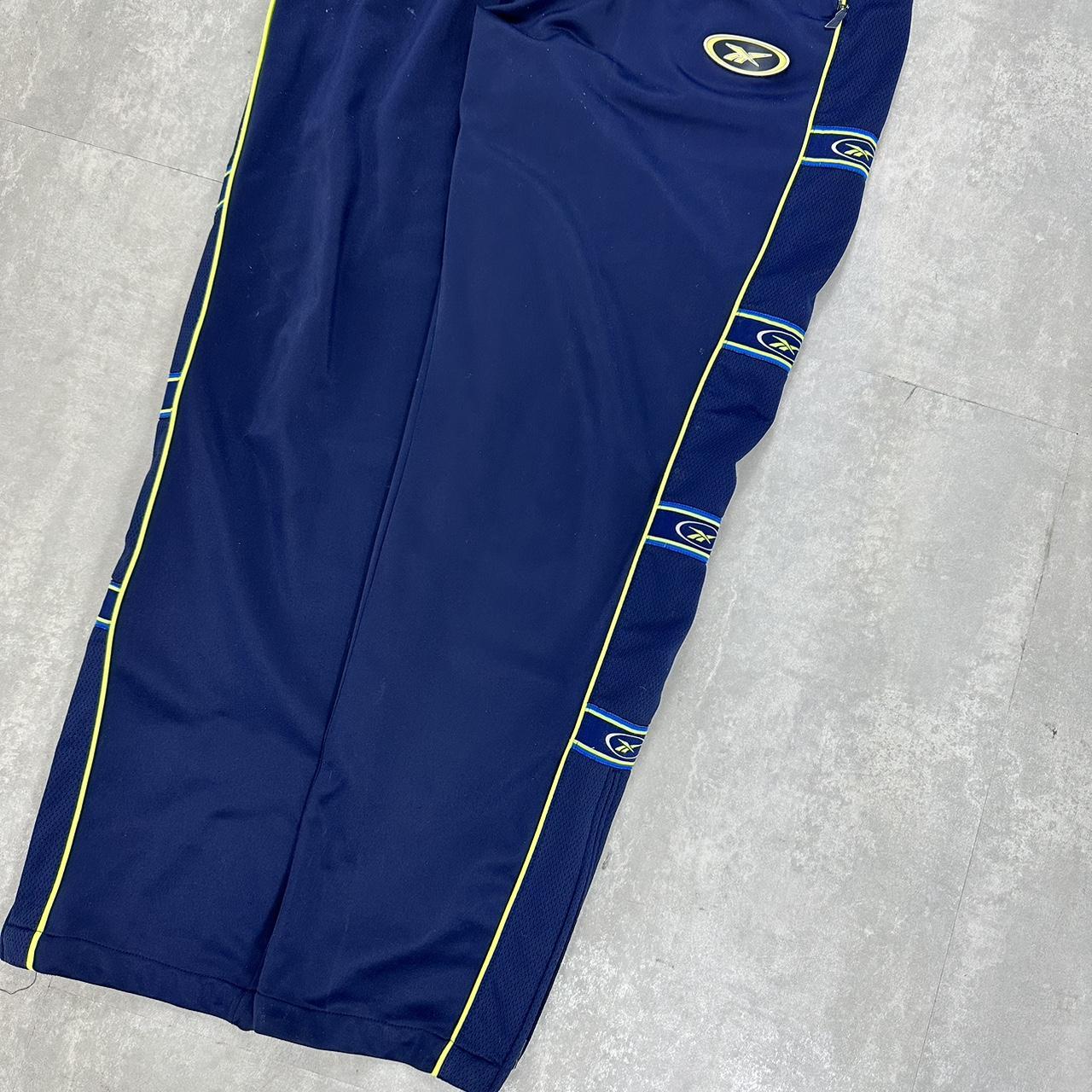 Reebok 2000s spell out taper trackpants