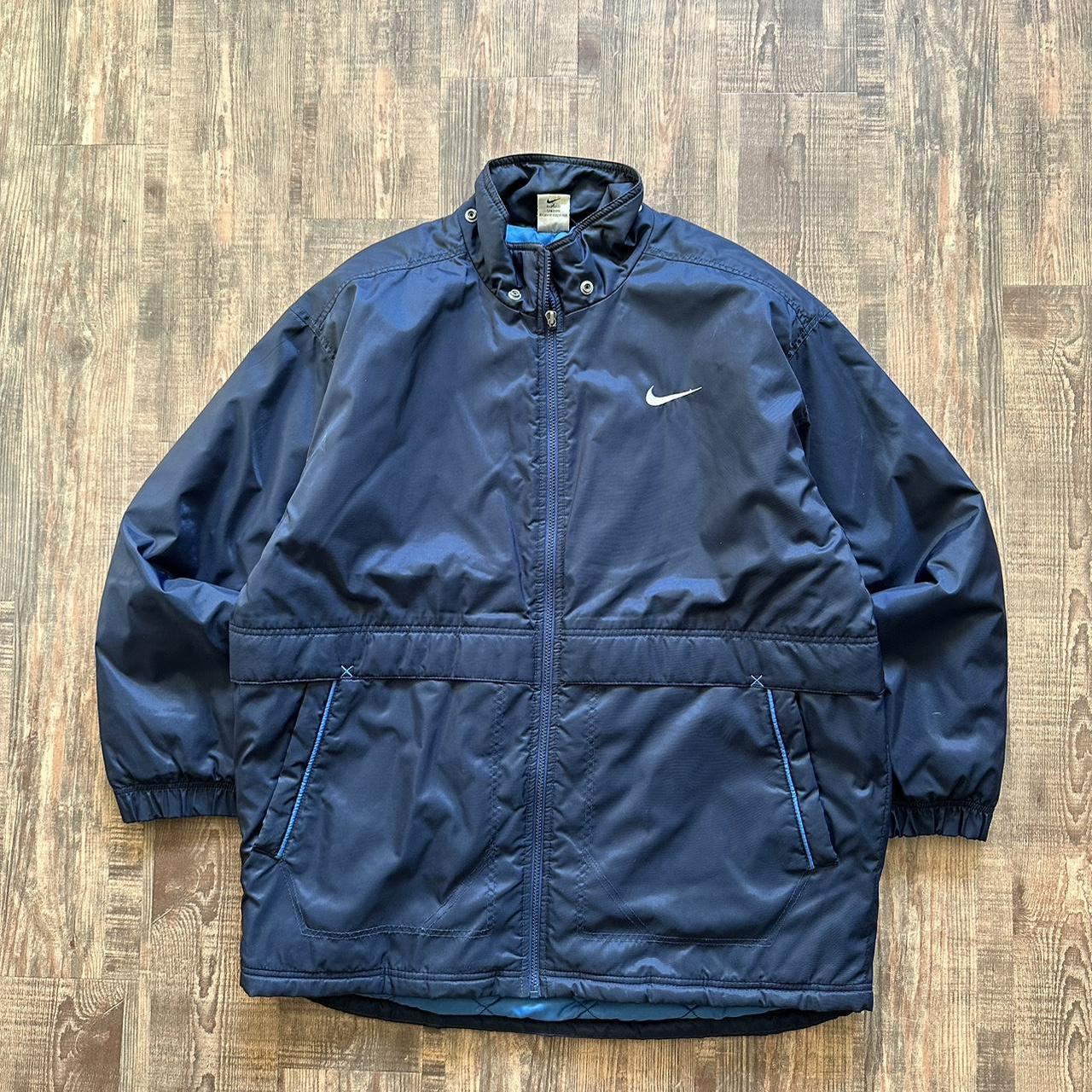 Nike 00s padded jacket in navy with big classic swoosh on back and blue padded lining