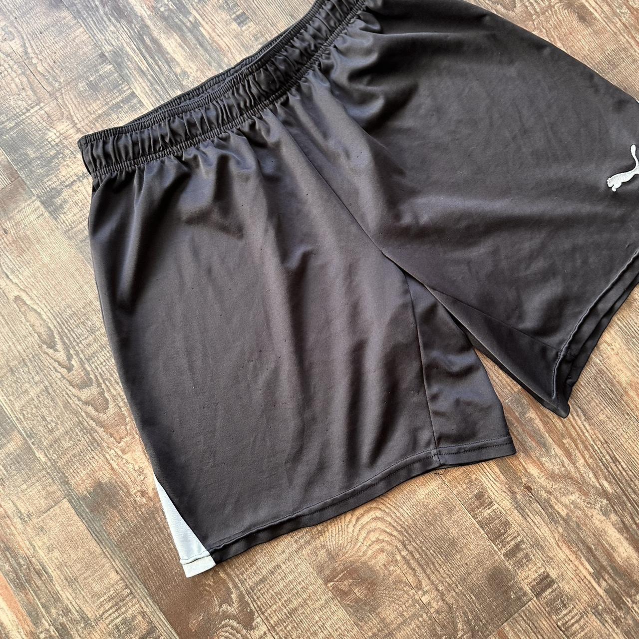 Puma vintage y2k shorts in black with white detailing down sides and mini logo