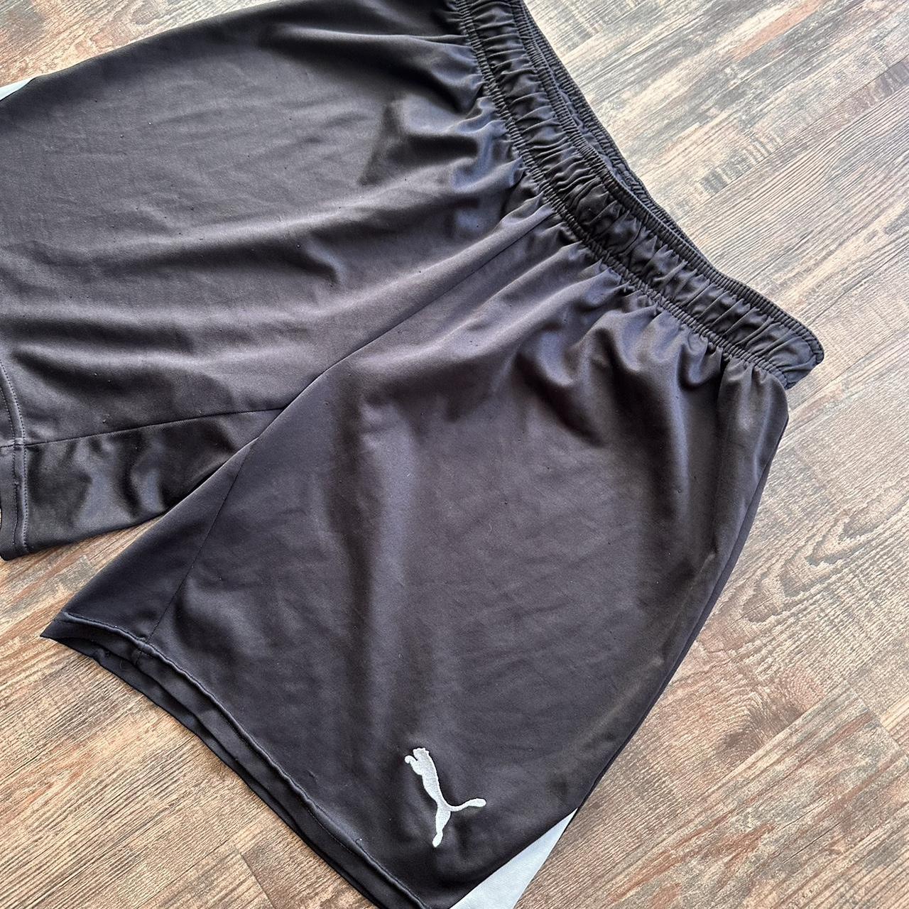 Puma vintage y2k shorts in black with white detailing down sides and mini logo