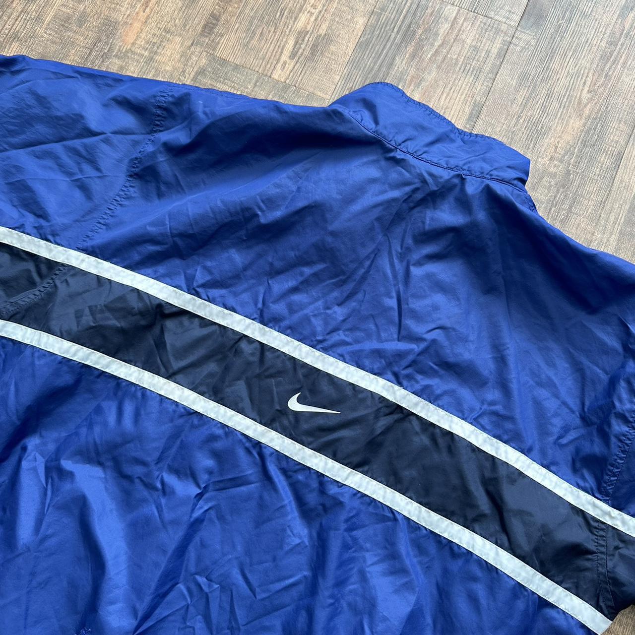 Nike 00s vintage jacket in blue and black with white detailing