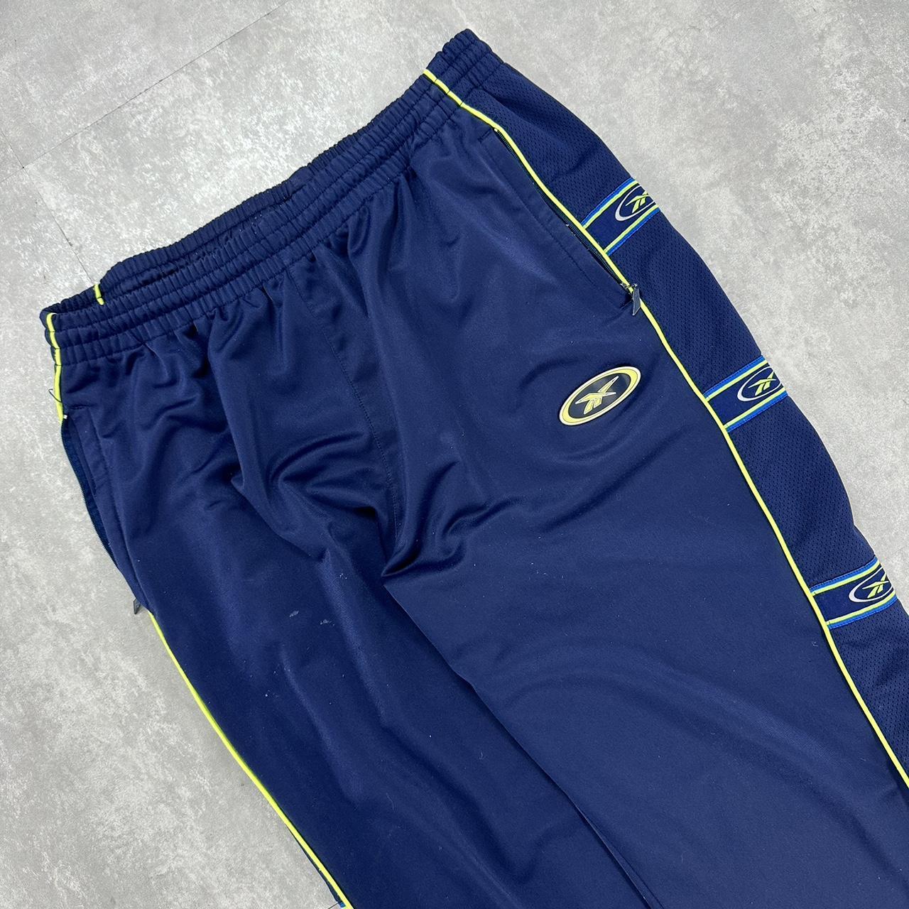 Reebok 2000s spell out taper trackpants