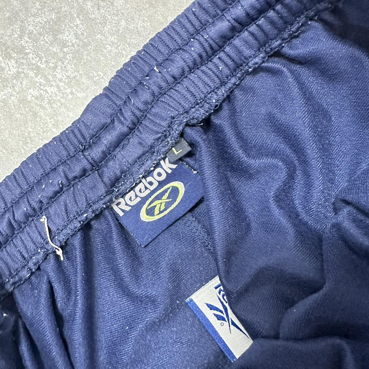 Reebok 2000s spell out taper trackpants