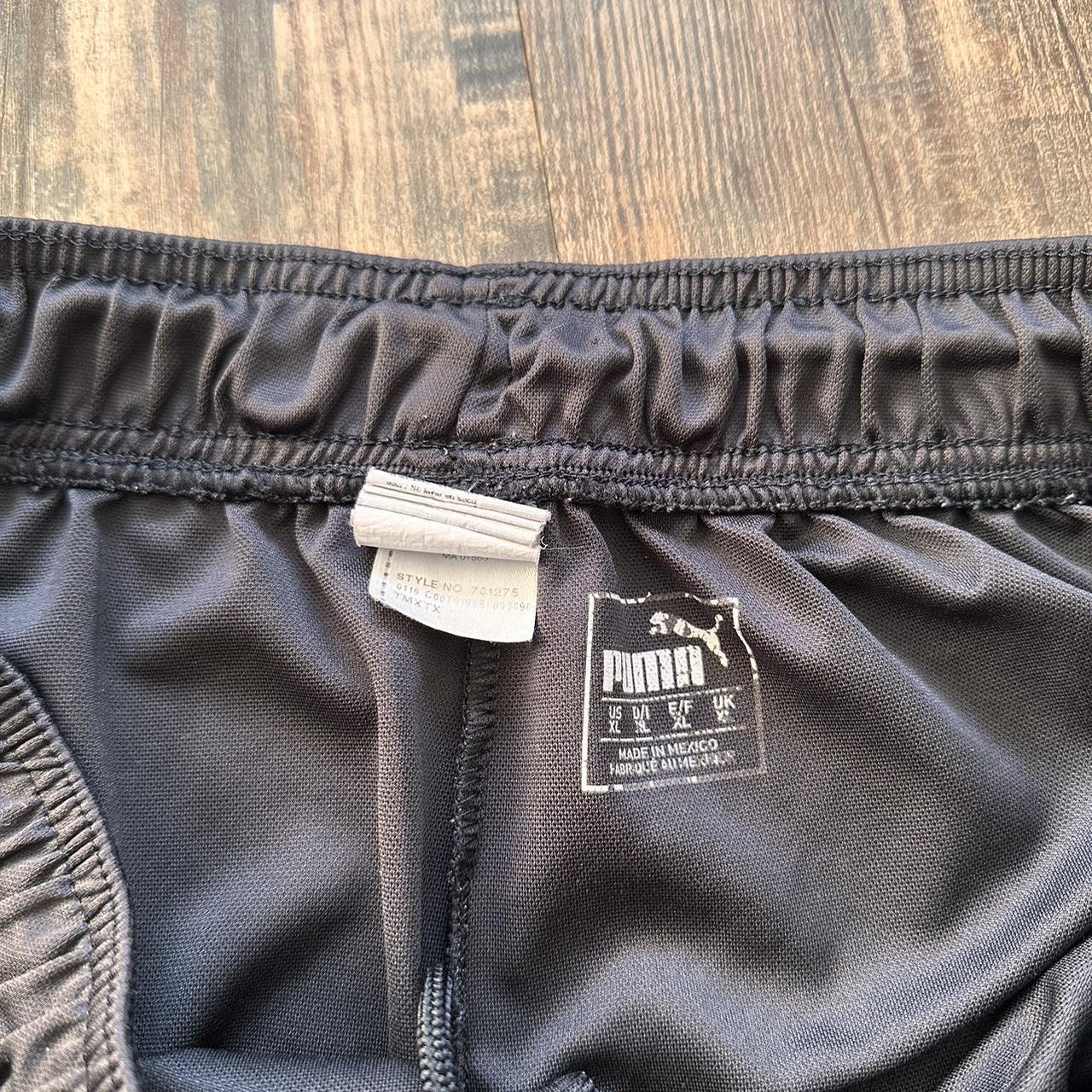 Puma vintage y2k shorts in black with white detailing down sides and mini logo