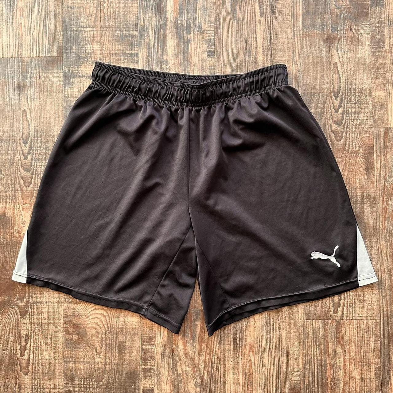 Puma vintage y2k shorts in black with white detailing down sides and mini logo