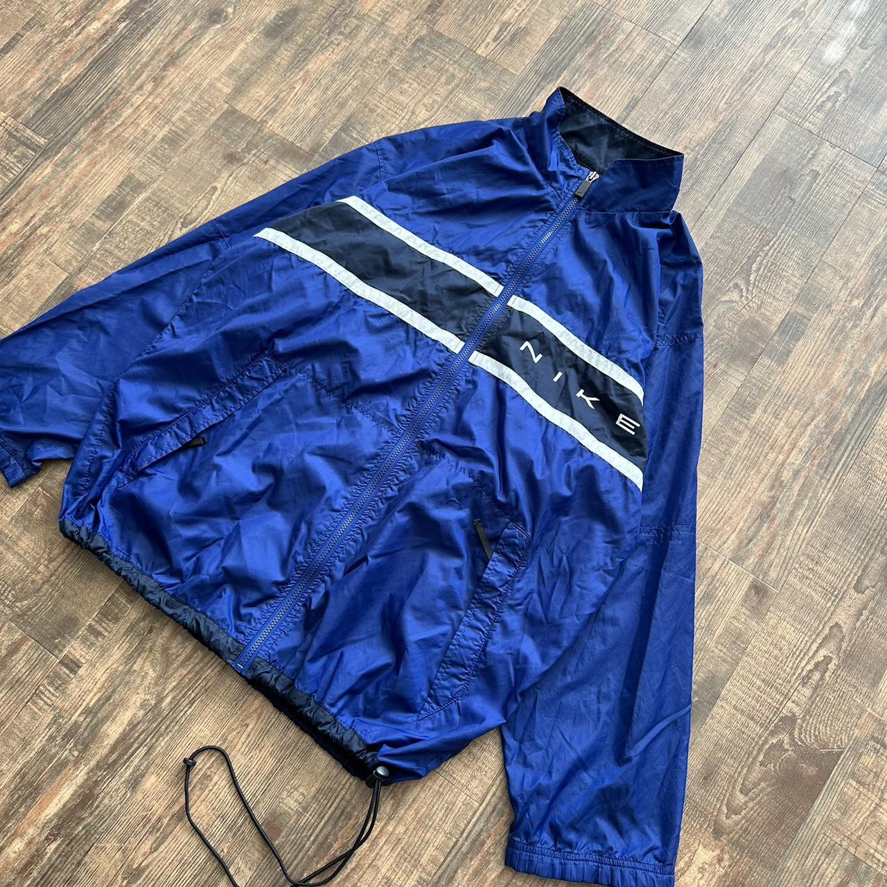 Nike 00s vintage jacket in blue and black with white detailing