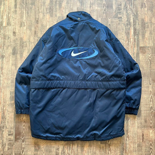 Nike 00s padded jacket in navy with big classic swoosh on back and blue padded lining