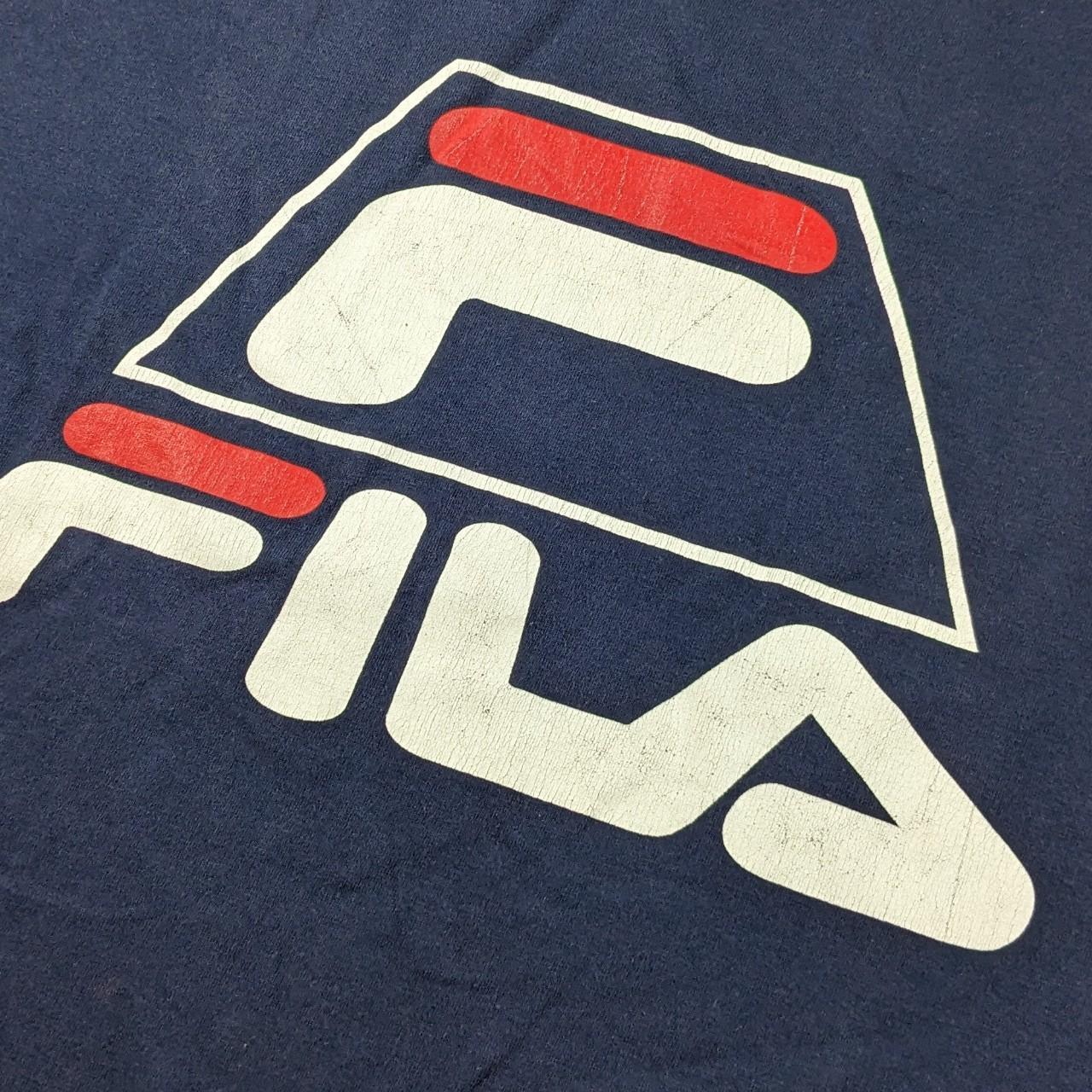 Fila Big 90s spell out T shirt in navy with logo on chest and rear neck