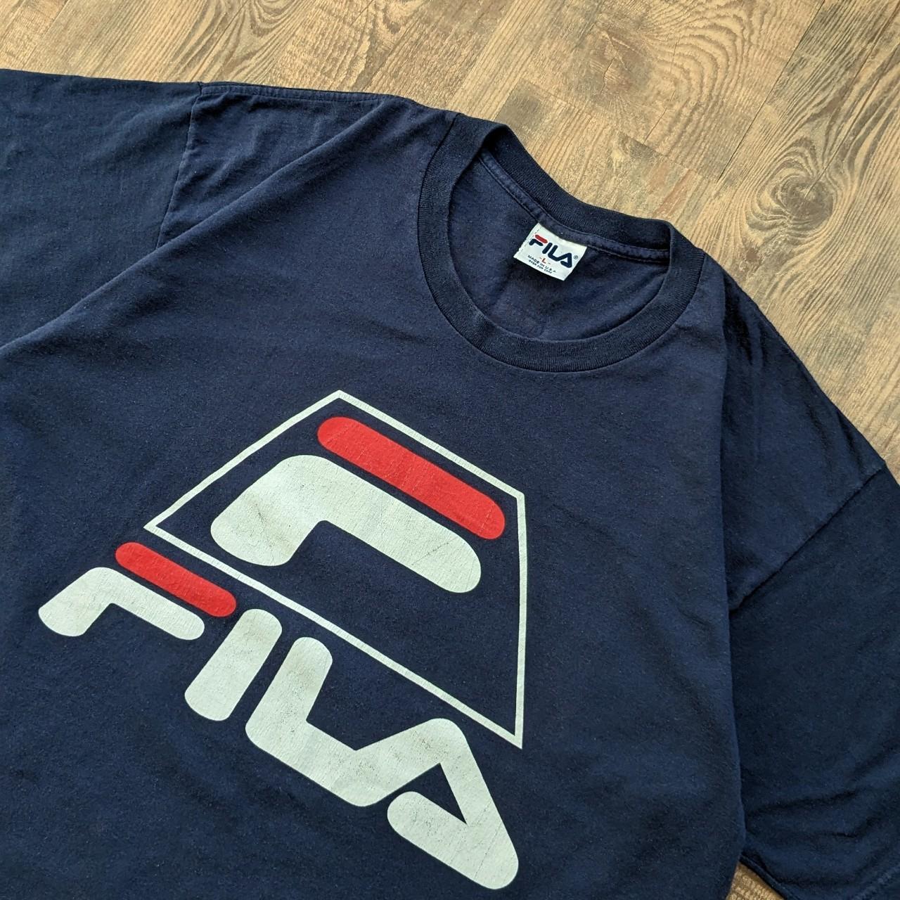 Fila Big 90s spell out T shirt in navy with logo on chest and rear neck