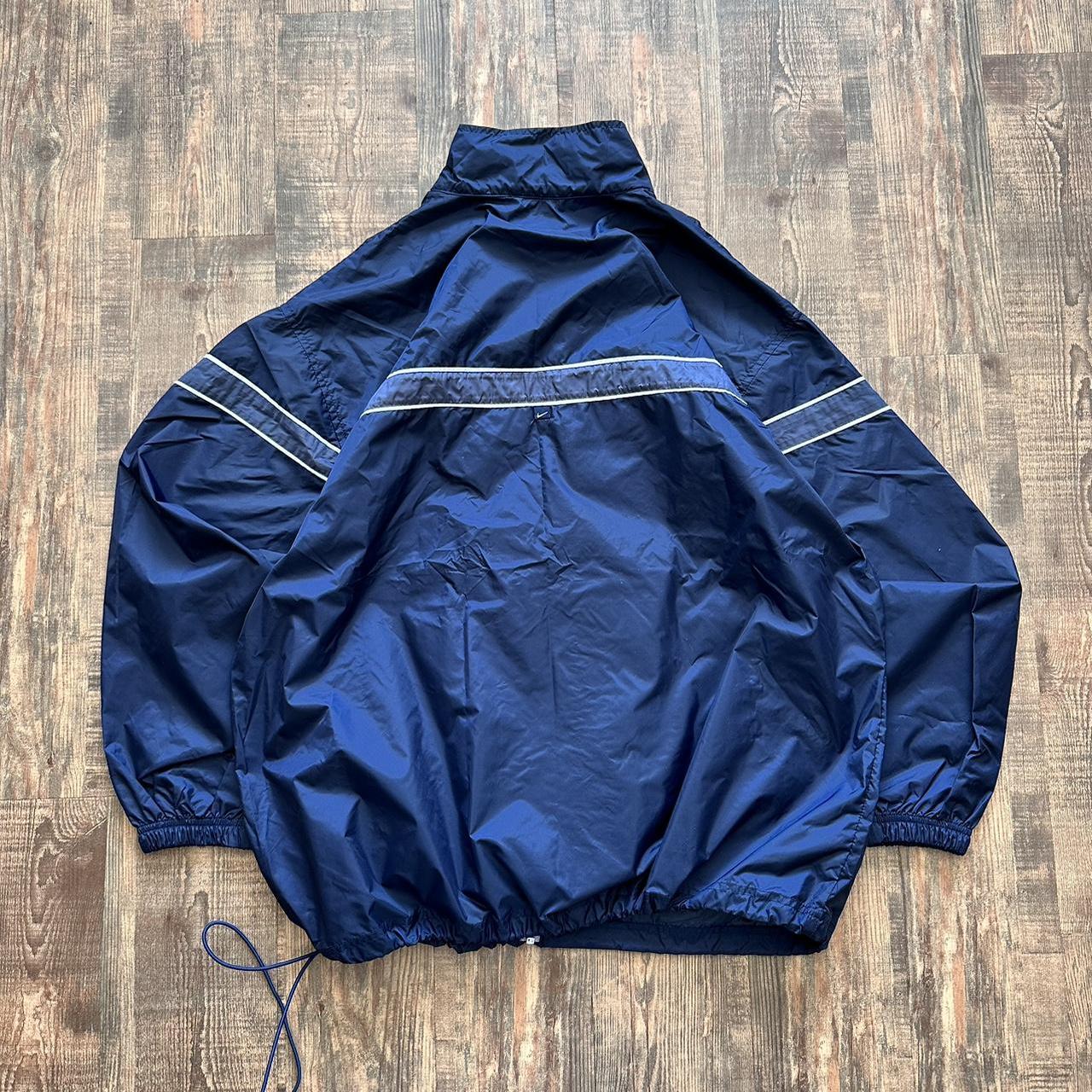 Nike 00s windbreaker thin layer jacket in dark blue with light blue detailing