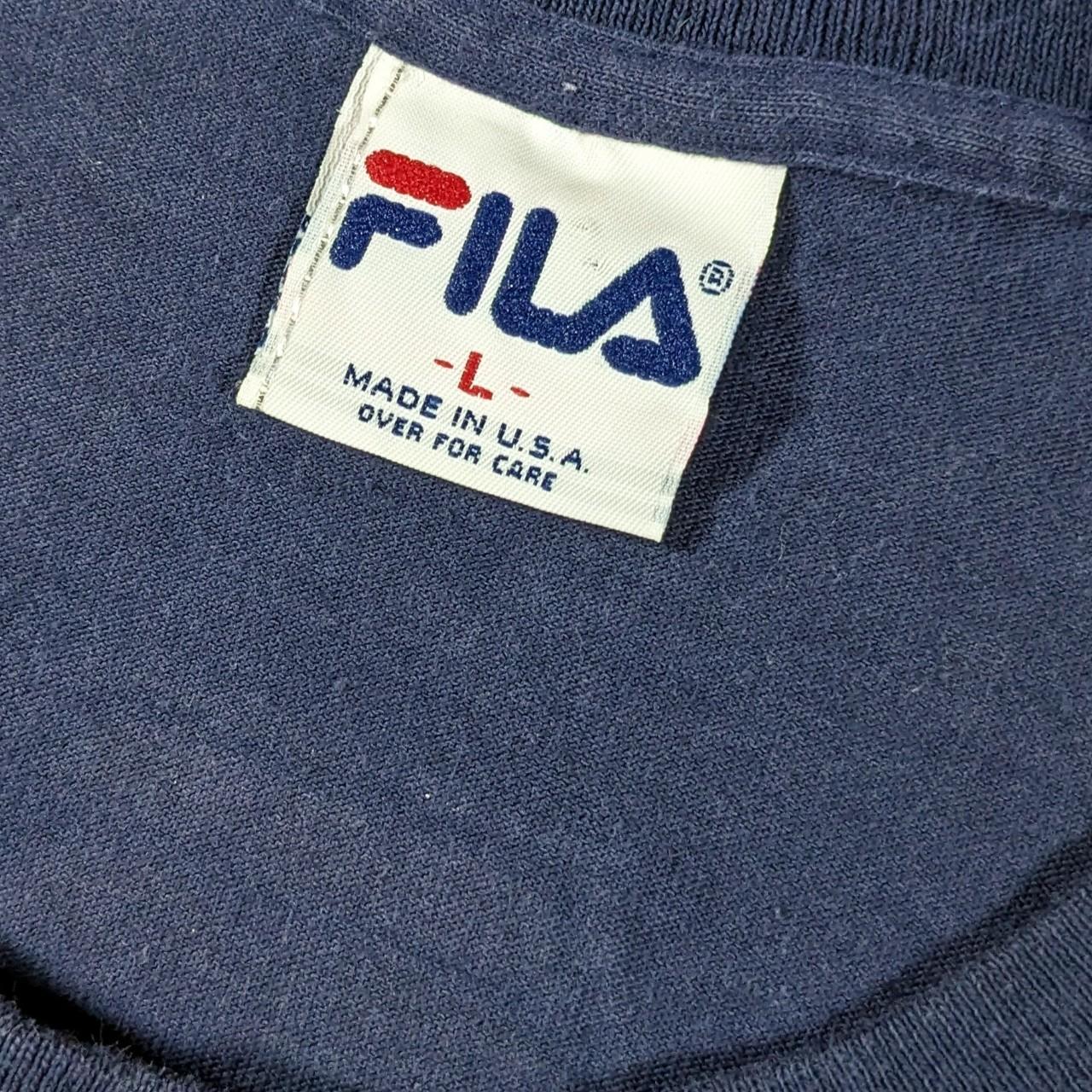 Fila Big 90s spell out T shirt in navy with logo on chest and rear neck