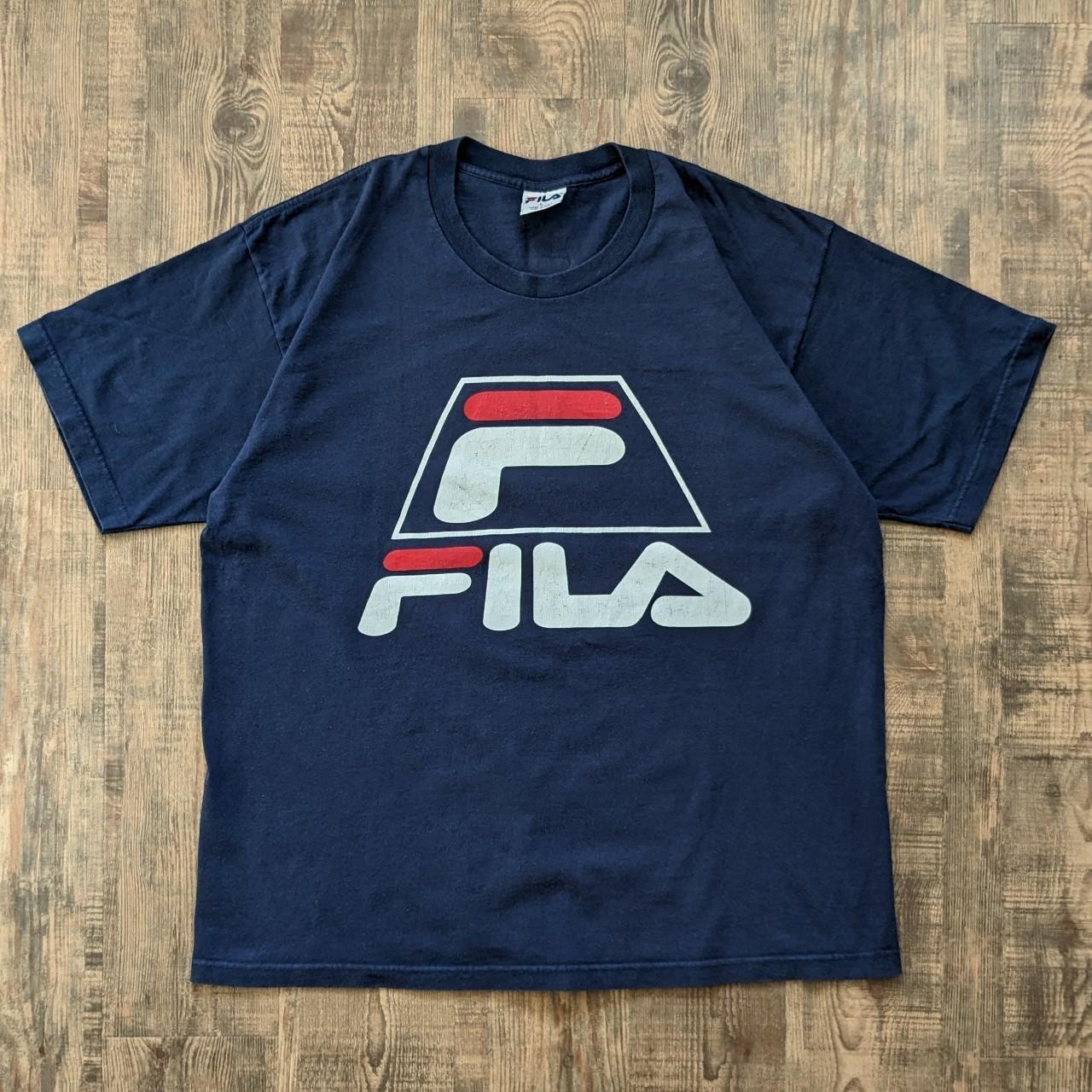 Fila Big 90s spell out T shirt in navy with logo on chest and rear neck